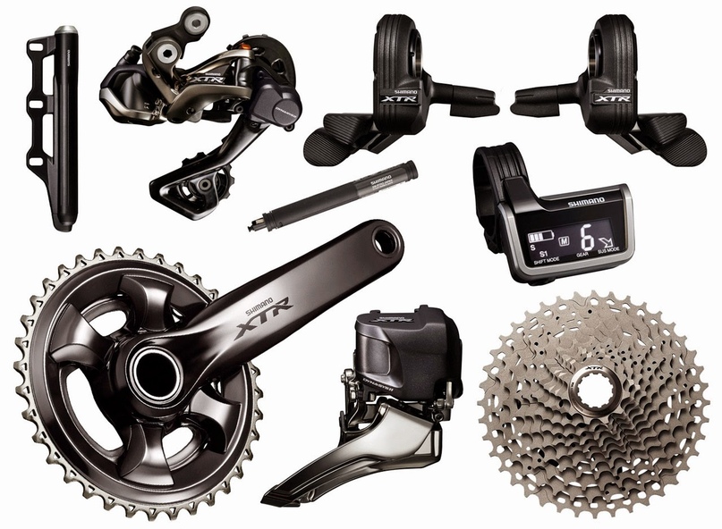 XTR Di2 (11 звезд) - топовая электронная трансмиссия МТБ от Shimano (производится с 2014 года). Задний переключатель Shimano XTR Di2 M9050 работает за счет сервомотора, который спрятан в специальном закрытом модуле, полностью защищенном от влаги и грязи. Также передний переключатель синхронизирован с задним, что позволяет автоматически компенсировать перекос цепи при использовании некоторых передач. Компоненты построены на базе линейки Shimano XTR M9000, за исключением серво-моторов. Di2 поддерживает любую трансмиссию с 11-ю передачами сзади, т.е. спереди может быть установлено любое количество звезд. Максимальная звезда кассеты: 40Т. Топовая модель - М9050.